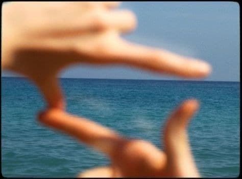 Hands framing vision